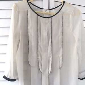 Ultra feminine cream blouse with black detail